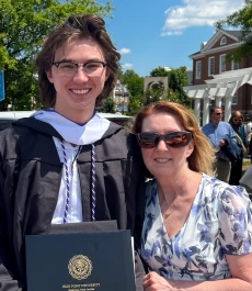 Kendrick with mom just after HPU’s graduation ceremony in May 2023.